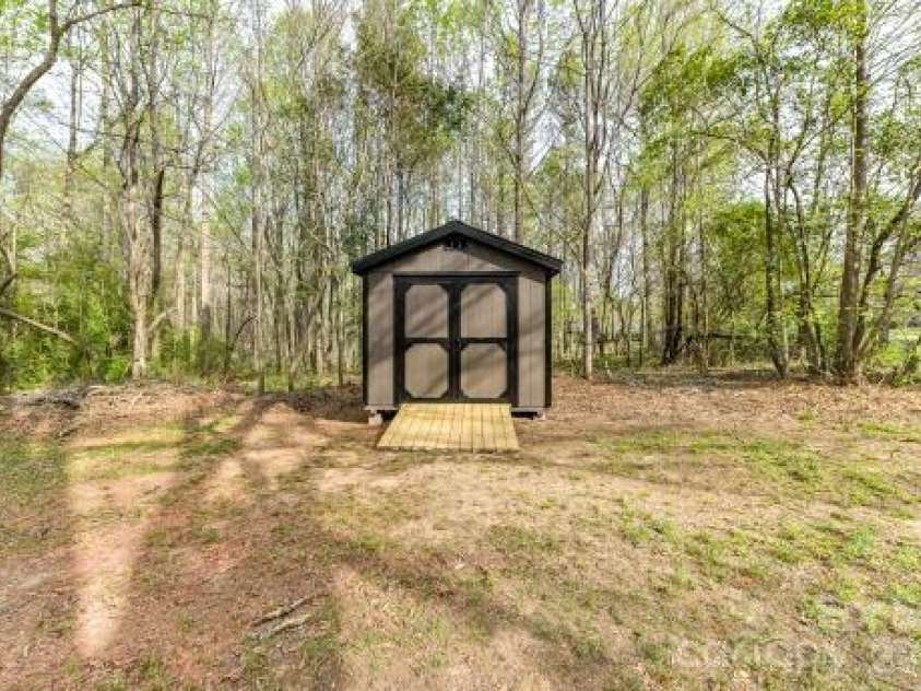 7714 Old Waxhaw Monroe Road, Waxhaw, NC 28173.  MLS# CAR4355316, YatesRealty ID 8306. New storage building