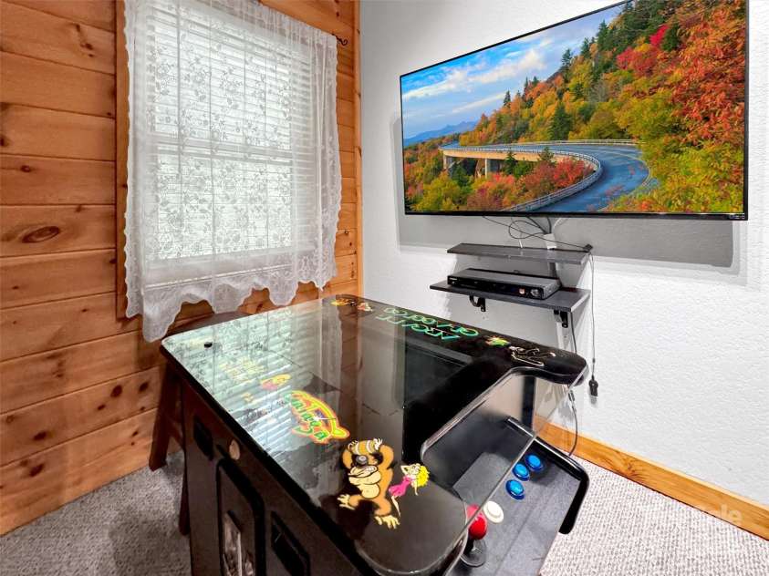 1064 Point Of View Drive, Waynesville, NC 28785.  MLS# CAR4277940, YatesRealty ID 831. Upstairs den, game room