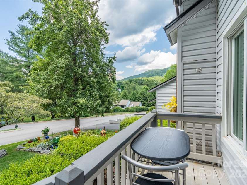 211 Cheyenne Court, Asheville, NC 28803.  MLS# CAR4160784, YatesRealty ID 8314. Mountain views from the front porch.