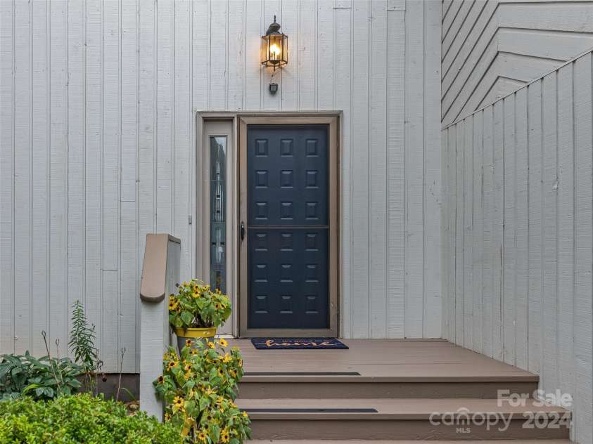 141 Deerlake Drive, Asheville, NC 28803.  MLS# CAR4170906, YatesRealty ID 8315. Front porch