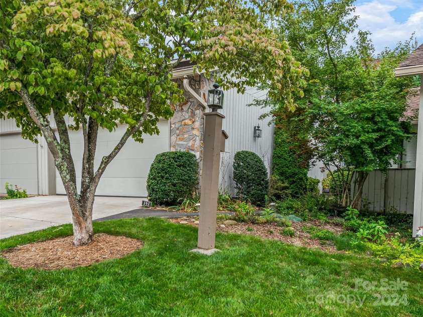 141 Deerlake Drive, Asheville, NC 28803.  MLS# CAR4170906, YatesRealty ID 8315. Mature landscaping