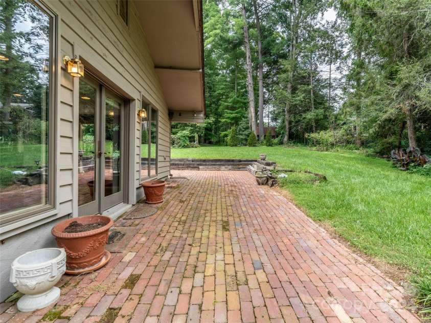 127 Springside Road, Asheville, NC 28803.  MLS# CAR4171365, YatesRealty ID 8316. Back patio