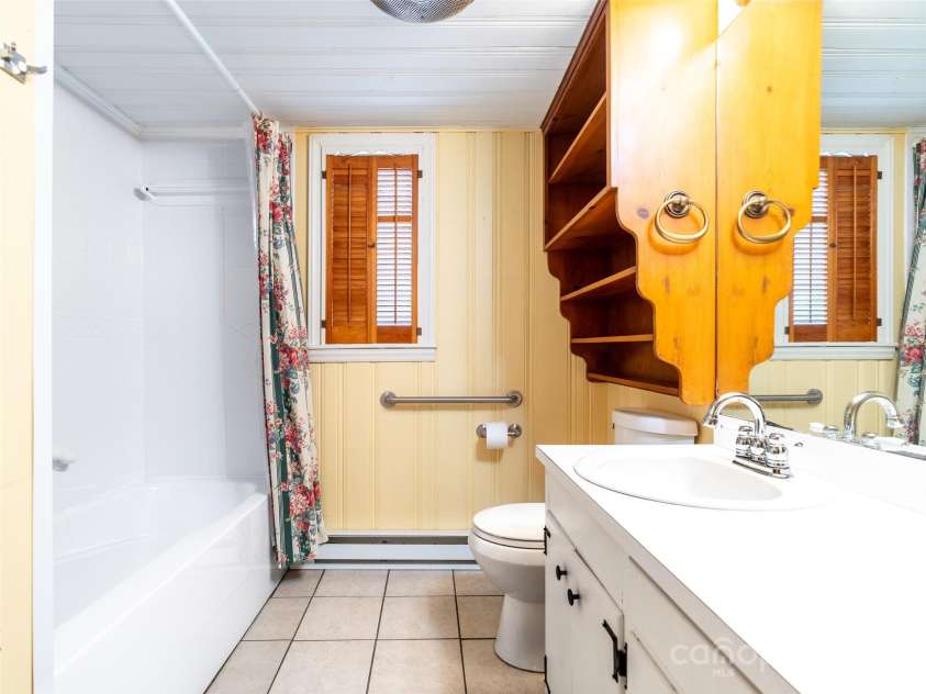127 Springside Road, Asheville, NC 28803.  MLS# CAR4171365, YatesRealty ID 8316. Main Level full bath for guest