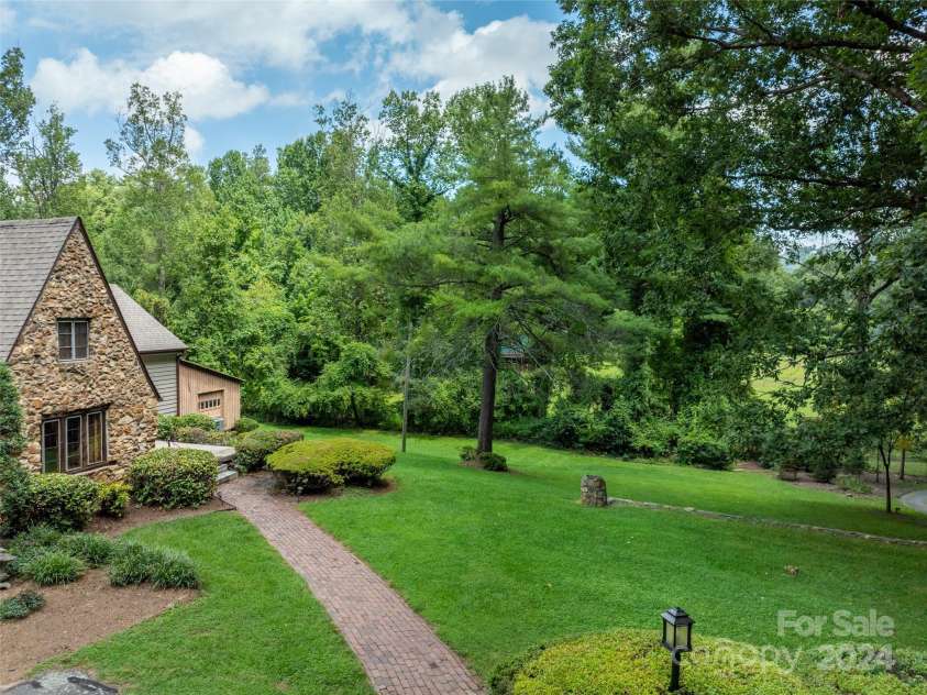 127 Springside Road, Asheville, NC 28803.  MLS# CAR4171365, YatesRealty ID 8316. Private but central location