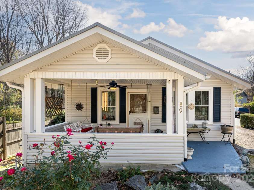 89 Woodrow Avenue, Asheville, NC 28801.  MLS# CAR4186528, YatesRealty ID 8319. Charming cottage in the heart of the Five Points neighborhood offers quintessential Asheville living