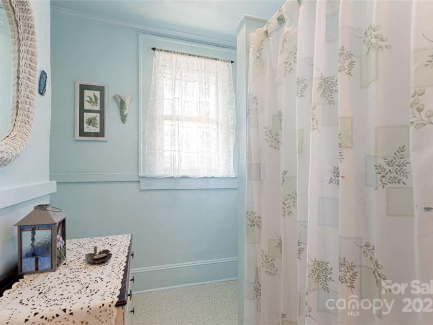 89 Woodrow Avenue, Asheville, NC 28801.  MLS# CAR4186528, YatesRealty ID 8319. Updated bathroom