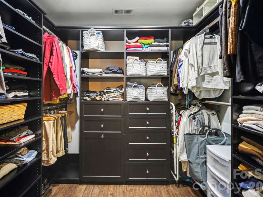 4629 Halstead Drive, Charlotte, NC 28209.  MLS# CAR4358166, YatesRealty ID 8322. Primary walk in closet with elevated shelving