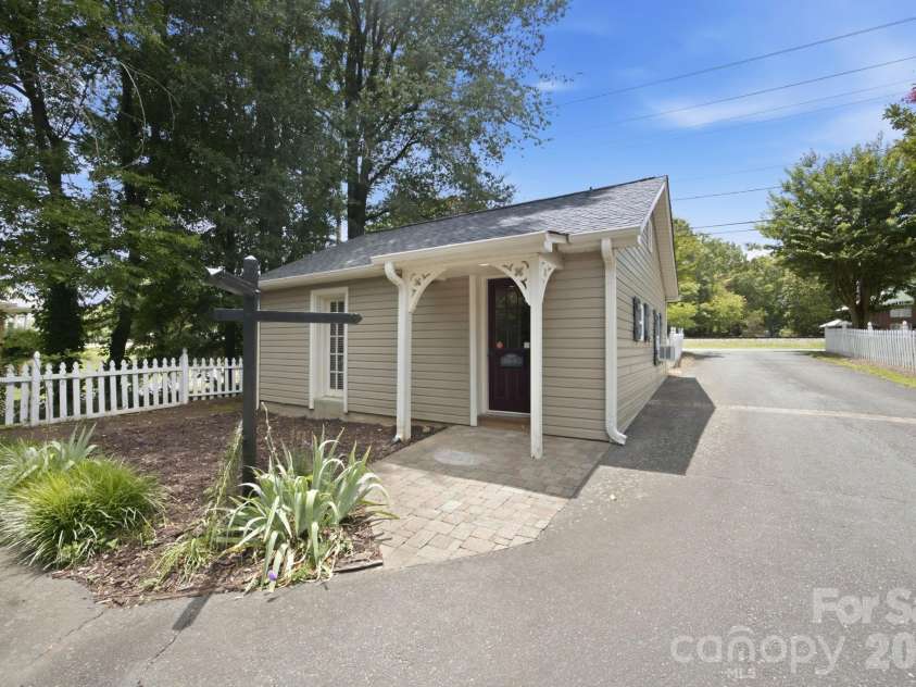 19428 Zion Avenue, Cornelius, NC 28031.  MLS# CAR4314350, YatesRealty ID 8324. Back entry of Studio