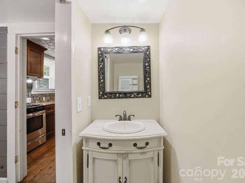 19428 Zion Avenue, Cornelius, NC 28031.  MLS# CAR4314350, YatesRealty ID 8324. Half bath