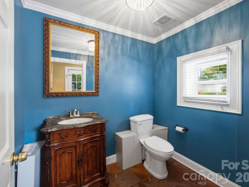 19428 Zion Avenue, Cornelius, NC 28031.  MLS# CAR4314350, YatesRealty ID 8324. Half bathroom