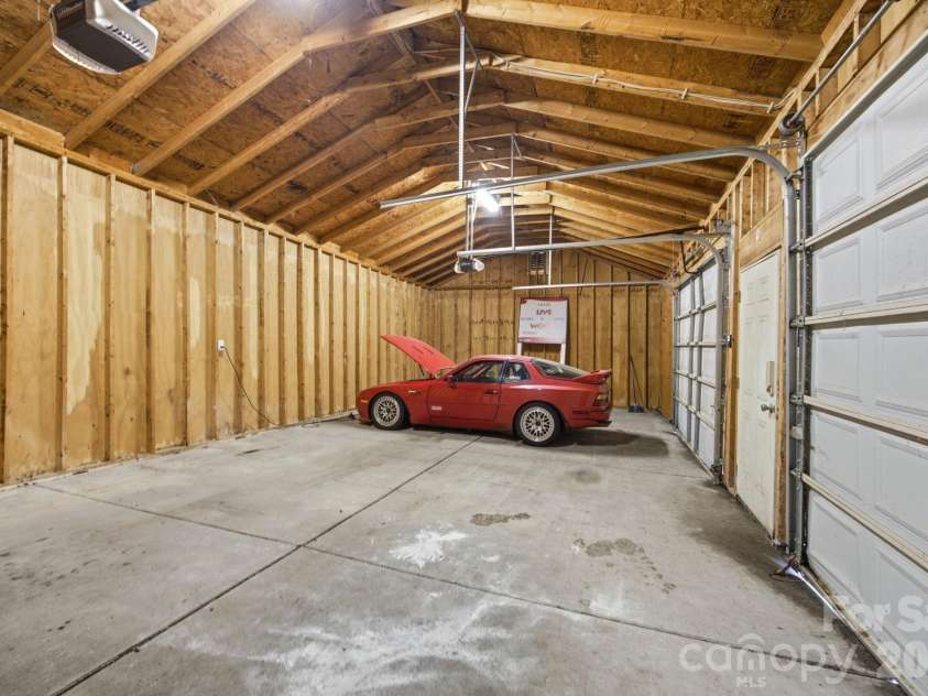 19428 Zion Avenue, Cornelius, NC 28031.  MLS# CAR4314350, YatesRealty ID 8324. Inside Garage