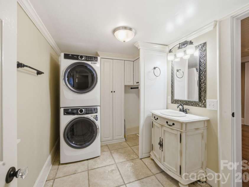 19428 Zion Avenue, Cornelius, NC 28031.  MLS# CAR4314350, YatesRealty ID 8324. Primary bath has washer & dryer