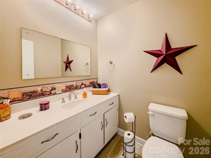 142 Padgett-Burns Road, Forest City, NC 28043.  MLS# CAR4352088, YatesRealty ID 8326. Half Bath Main Floor