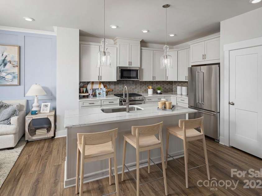 9400 Munsing Drive, Charlotte, NC 28269.  MLS# CAR4212954, YatesRealty ID 833. Representative of the Fontana Elite floorplan. Finishes and features may vary
