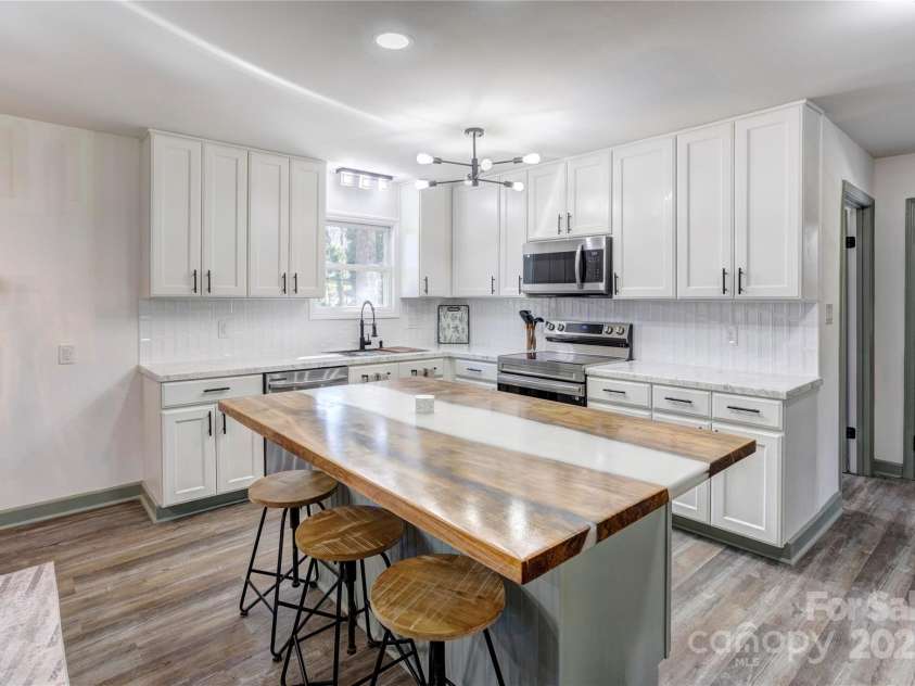 308 Dakota Street, Kannapolis, NC 28083.  MLS# CAR4227333, YatesRealty ID 8330. NEW cabinets, appliances, and custom island.