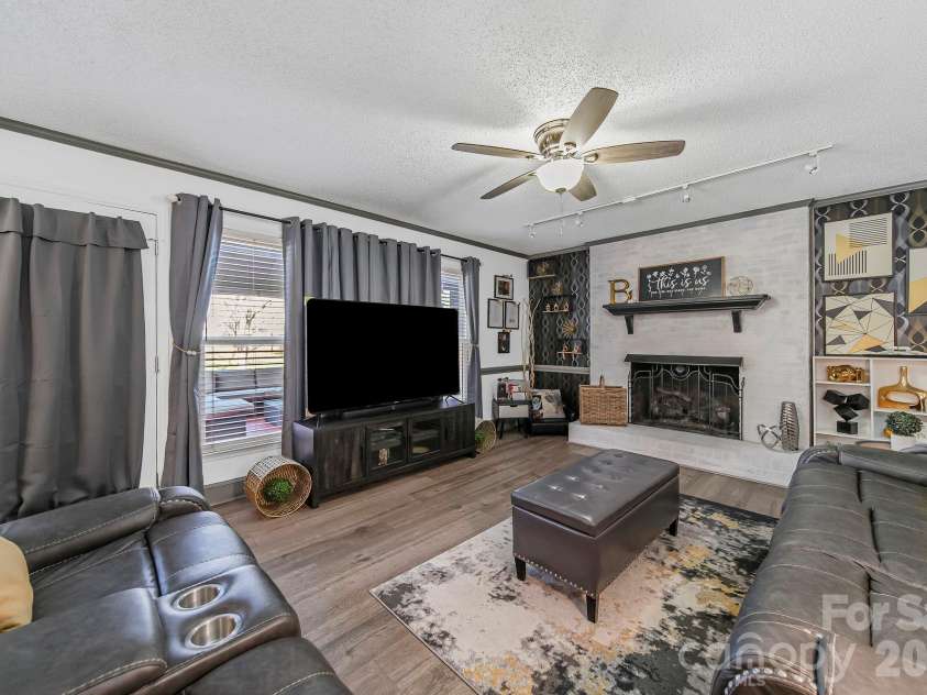 6116 Corkstone Drive, Mint Hill, NC 28227.  MLS# CAR4343873, YatesRealty ID 8334. Family Room