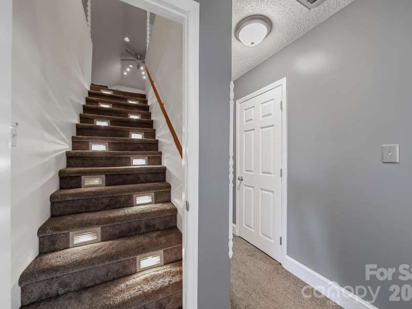 6116 Corkstone Drive, Mint Hill, NC 28227.  MLS# CAR4343873, YatesRealty ID 8334. Staircase to the Third Floor