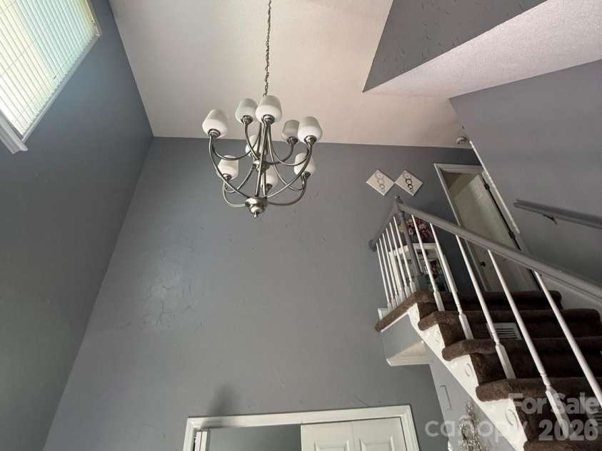 6116 Corkstone Drive, Mint Hill, NC 28227.  MLS# CAR4343873, YatesRealty ID 8334. Two story vaulted ceiling at entry