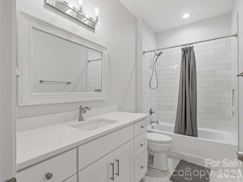 1022 Fleming Lane, Matthews, NC 28104.  MLS# CAR4375800, YatesRealty ID 8336. 2nd bath downstairs