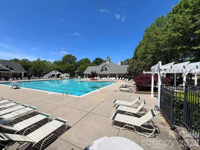 1022 Fleming Lane, Matthews, NC 28104.  MLS# CAR4375800, YatesRealty ID 8336. Community pool