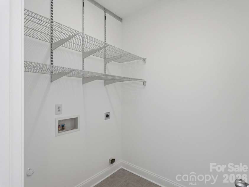 1022 Fleming Lane, Matthews, NC 28104.  MLS# CAR4375800, YatesRealty ID 8336. Laundry room