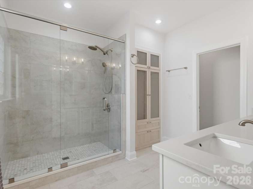1022 Fleming Lane, Matthews, NC 28104.  MLS# CAR4375800, YatesRealty ID 8336. Primary bathroom
