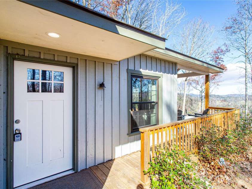 426, 428 Weaver Creek Road, Brevard, NC 28712.  MLS# CAR4322067, YatesRealty ID 8338. Berm home features 1 bath 1 bedroom with a flex room and an open layout!