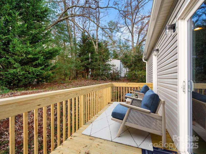 66 Drexel Road, Hendersonville, NC 28739.  MLS# CAR4241409, YatesRealty ID 8338. Virtually staged back deck