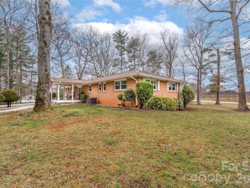 1034 Orchard Road, Flat Rock, NC 28731.  MLS# CAR4351377, YatesRealty ID 8340. 