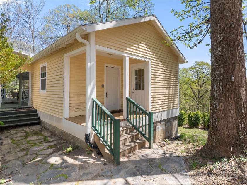 443 Shand Street, Saluda, NC 28773.  MLS# CAR4247244, YatesRealty ID 8346. Detached kitchen, view from parking area