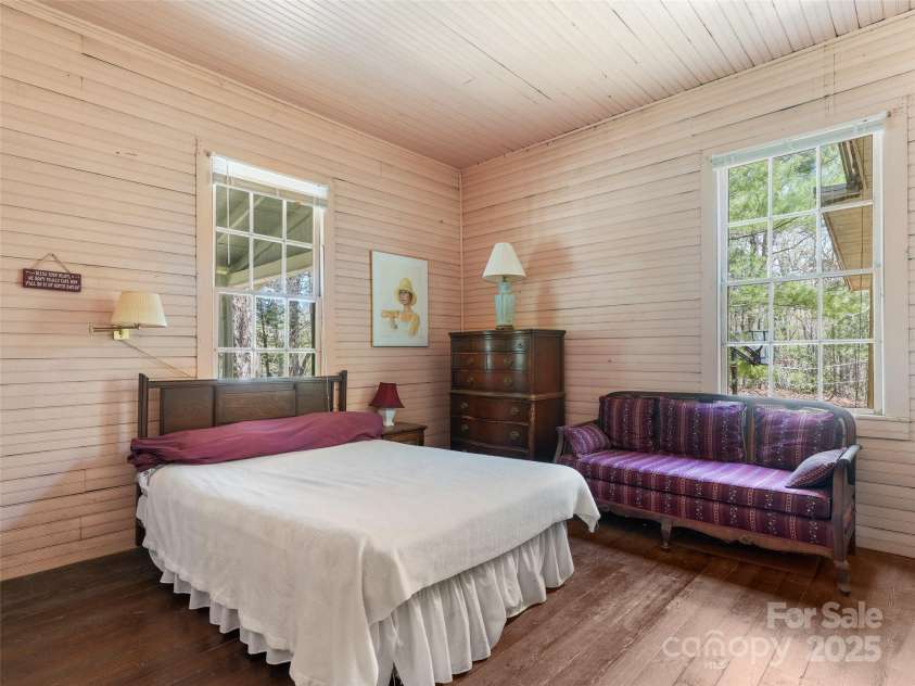 443 Shand Street, Saluda, NC 28773.  MLS# CAR4247244, YatesRealty ID 8346. Downstairs bedroom 1