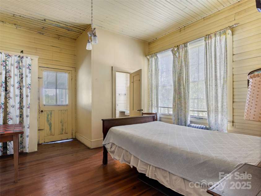 443 Shand Street, Saluda, NC 28773.  MLS# CAR4247244, YatesRealty ID 8346. Downstairs bedroom 3 with half bath