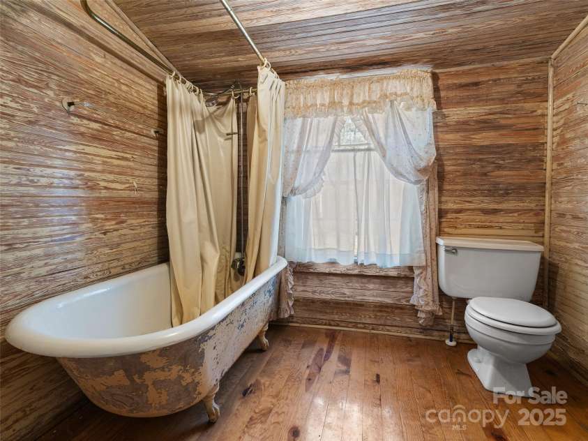 443 Shand Street, Saluda, NC 28773.  MLS# CAR4247244, YatesRealty ID 8346. Downstairs full bathroom