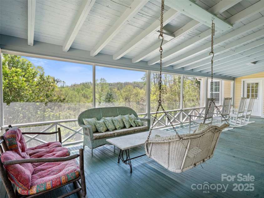 443 Shand Street, Saluda, NC 28773.  MLS# CAR4247244, YatesRealty ID 8346. Screened porch with detached kitchen