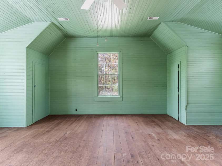 443 Shand Street, Saluda, NC 28773.  MLS# CAR4247244, YatesRealty ID 8346. Upstairs bedroom 1