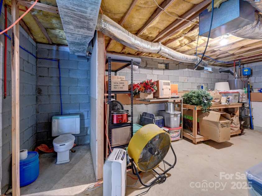 417 Royal Pines Drive, Arden, NC 28704.  MLS# CAR4247214, YatesRealty ID 8347. Basement toilet