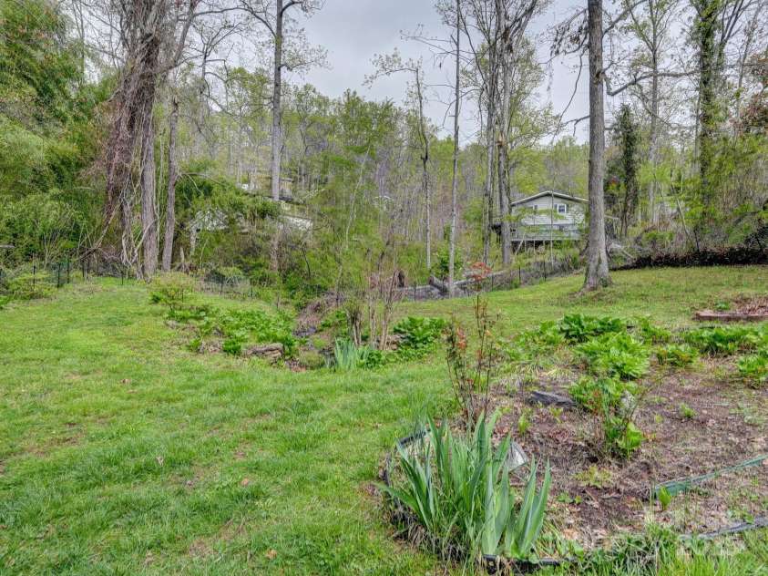 417 Royal Pines Drive, Arden, NC 28704.  MLS# CAR4247214, YatesRealty ID 8347. Creek/Waterfall