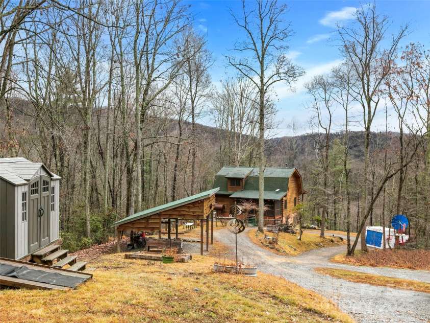 1239 Lower Loop Drive, Fletcher, NC 28732.  MLS# CAR4327631, YatesRealty ID 835. Double carport and 2 storage buildings