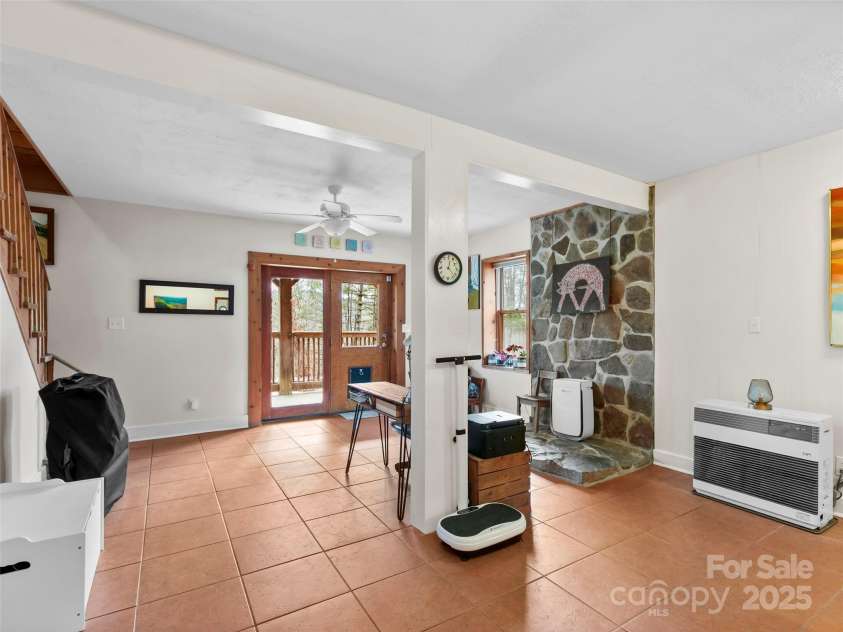 1239 Lower Loop Drive, Fletcher, NC 28732.  MLS# CAR4327631, YatesRealty ID 835. Family Room in Basement