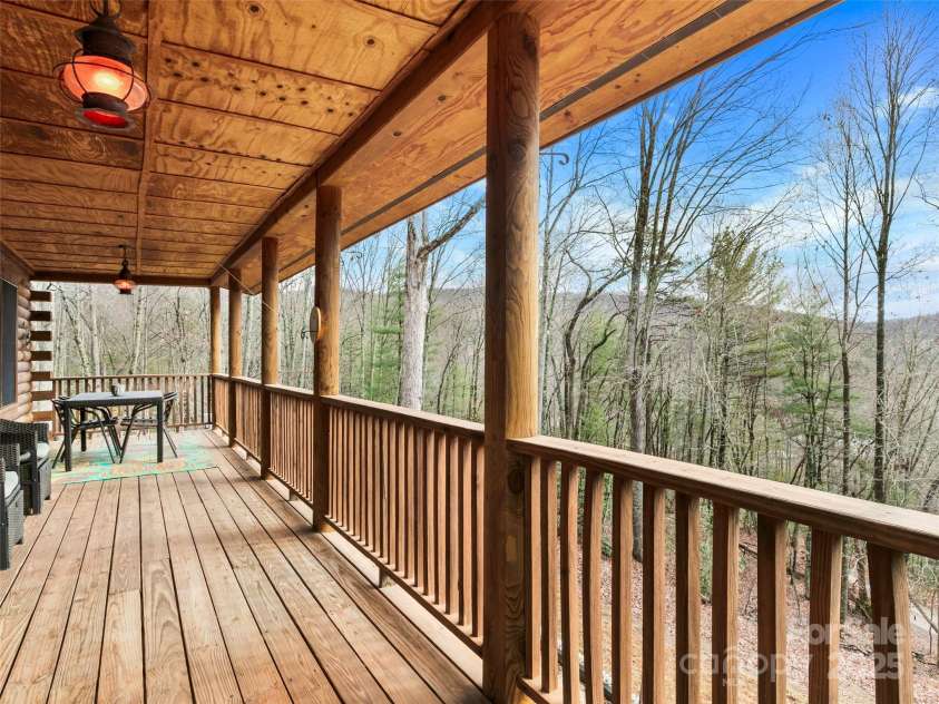 1239 Lower Loop Drive, Fletcher, NC 28732.  MLS# CAR4327631, YatesRealty ID 835. Main level covered deck with views!