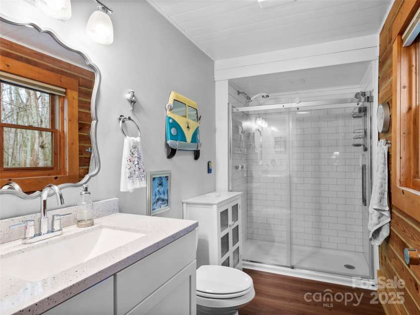 1239 Lower Loop Drive, Fletcher, NC 28732.  MLS# CAR4327631, YatesRealty ID 835. Updated bathroom on main level