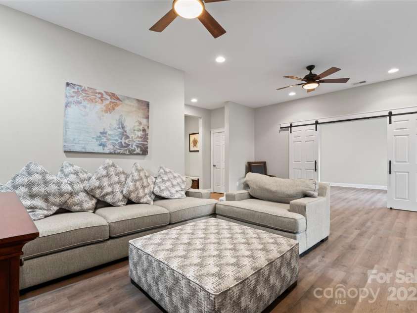 428 Vintage Hill Lane, Huntersville, NC 28078.  MLS# CAR4202236, YatesRealty ID 8353. FINISHED BASEMENT MEDUA ROOM
