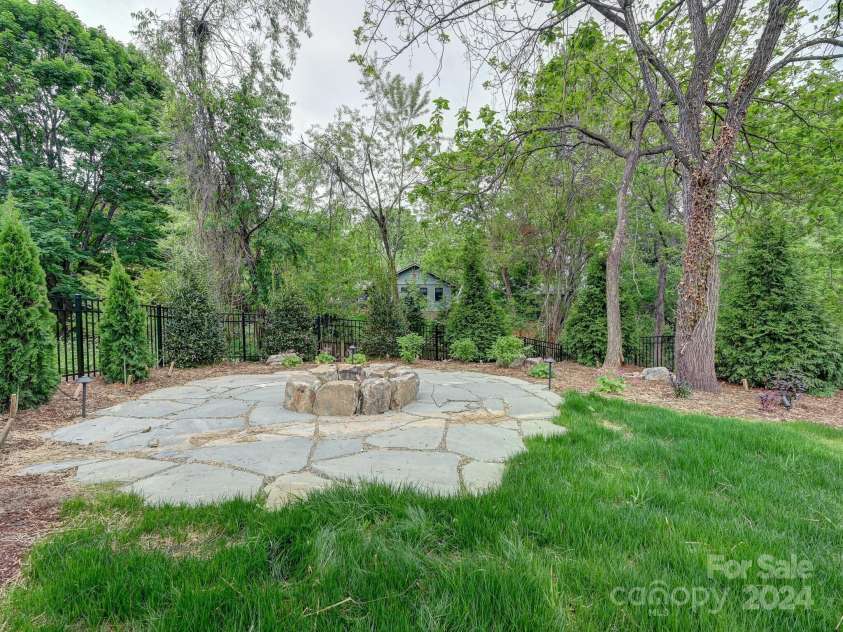 18 Sand Hill Road, Asheville, NC 28806.  MLS# CAR4125014, YatesRealty ID 8355. Generous fire pit area for cool evenings