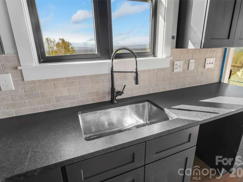 4898 Soaring Top Lane, Lenoir, NC 28645.  MLS# CAR4364265, YatesRealty ID 8361. Kitchen sink with gorgeous mountain views