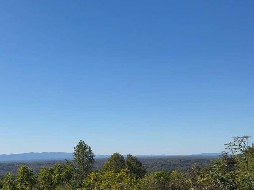 4898 Soaring Top Lane, Lenoir, NC 28645.  MLS# CAR4364265, YatesRealty ID 8361. Long range mountain views from the side deck
