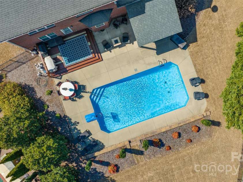 5608 Old Town Lane, Gastonia, NC 28056.  MLS# CAR4232073, YatesRealty ID 8361. Ariel over pool and backyard