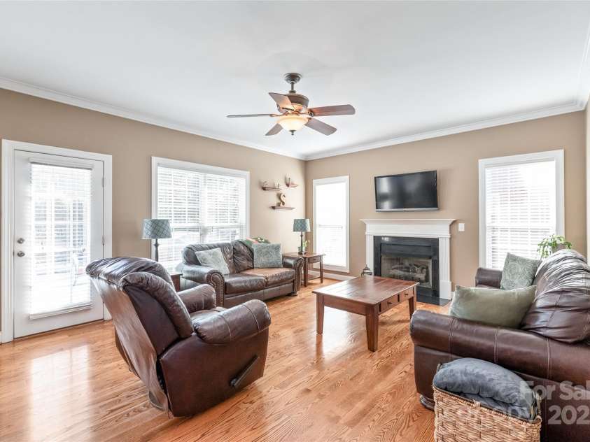 5608 Old Town Lane, Gastonia, NC 28056.  MLS# CAR4232073, YatesRealty ID 8361. Great Room with Fireplace with Pool Views