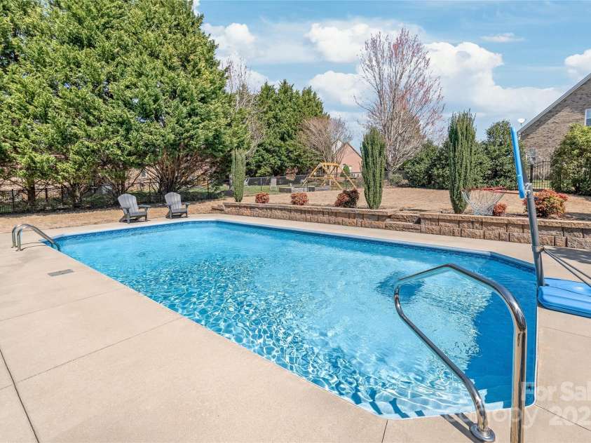 5608 Old Town Lane, Gastonia, NC 28056.  MLS# CAR4232073, YatesRealty ID 8361. Swim Anytime