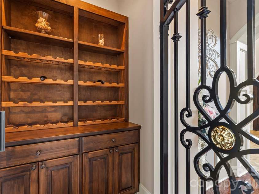 220 Fincher Road, Pauline, SC 29374.  MLS# CAR4363738, YatesRealty ID 8367. Elegant Wine Storage on Main Level