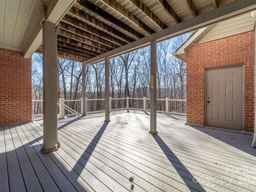 832 Asheville Highway, Sylva, NC 28779.  MLS# CAR4218308, YatesRealty ID 8367. Back Deck